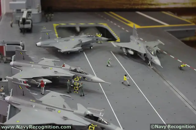 A scale model the Brazilian Navy Sao Paulo aircraft carrier with several "Sea Gripens" on the deck was shown recently by SAAB during the LAAD 2013 defense exhibition in Brazil