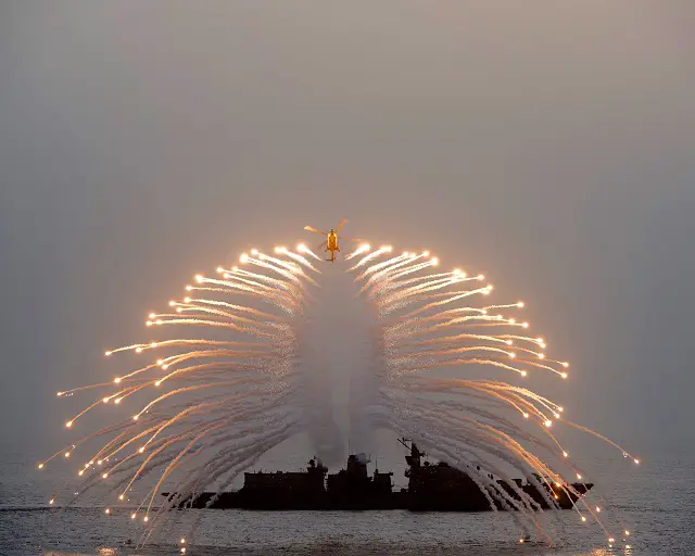 The Royal Navy released some stunning images showing the Lynx MK 8 helicopter from 815 Squadron, Royal Naval Air Station Yeovilton, litting up the night sky with her decoy flares as part of an exercise in the Indian Ocean.