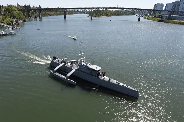 PORTLAND, Ore. (Apr. 7, 2016) Sea Hunter, an entirely new class of unmanned ocean-going vessel gets underway on the Williammette River following a christening ceremony in Portland, Ore. Part the of the Defense Advanced Research Projects Agency (DARPA)'s Anti-Submarine Warfare Continuous Trail Unmanned Vessel (ACTUV) program, in conjunction with the Office of Naval Research (ONR), is working to fully test the capabilities of the vessel and several innovative payloads, with the goal of transitioning the technology to Navy operational use once fully proven. (U.S. Navy photo by John F. Williams/Released)