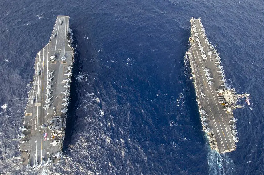 For the first time US Navy Ford class and Nimitz class aircraft carrier have operated together at sea 925 002
