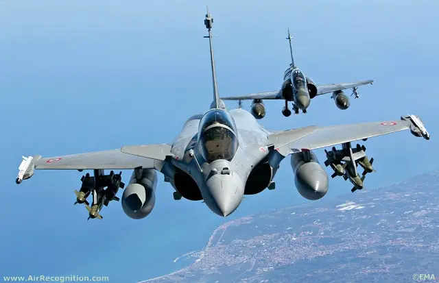 French Air Force Dassault Rafale B armed with 6 Sagem's AASM GPS bombs (foreground) and Dassault Mirage 2000D equiped with Thales' Damocles laser designation pod and 2 GBU-12 laser guided bombs (background).