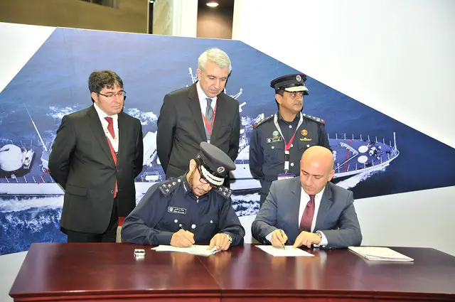 Deputy of Director Logistics Department, Brig. Abdullah Saad Al Kharji, representing the Ministry of Interior for the State of Qatar and Kerim Kalafatoglu, Chairman & Executive Director for ARES Shipyard signing the Memorandum of Understanding during DIMDEX 2014