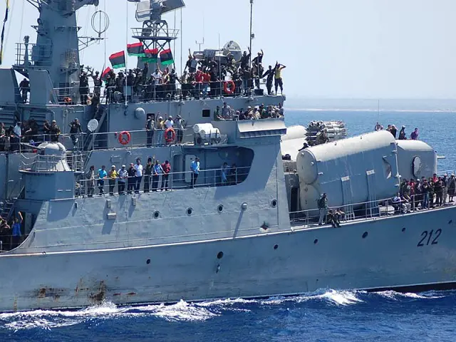 HMS Liverpool has escorted the Al Hani - flagship of the Free Libya Forces - into Tripoli harbour now the capital is no longer in the hands of Gaddafi's former regime.