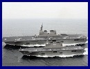 Japan plans to build a 19,500-ton aircraft carrier capable of housing helicopters after China launched its first own aircraft carrier, Chinese media reported on Wednesday. Japan already has two helicopter carriers -- the Hyuga deployed in March 2009 and the Ise deployed in March 2011 -- but the planned new vessel will be bigger.