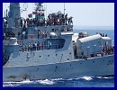 HMS Liverpool has escorted the Al Hani - flagship of the Free Libya Forces - into Tripoli harbour now the capital is no longer in the hands of Gaddafi's former regime.