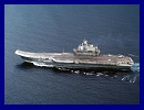 By 2027, Russia will have two new nuclear-powered aircraft carriers, one in the Northern Fleet and one in the Pacific Fleet. After years of discussions whether or not Russia needs large aircraft-carrying vessels or can cope with nuclear-powered submarines and cruisers, the admirals now have chosen an “American” fleet model consisting of vessel groups with an aircraft carrier in the center. The naval leaders believe this arrangement will make to possible to broaden Russia’s area of influence in the Pacific Ocean and the North Atlantic Ocean.