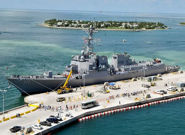 The restart of the U.S. Navy's DDG 51 Arleigh Burke destroyer building program swung in to a higher gear Sept. 26 with the award of two construction contracts and an option for a third.