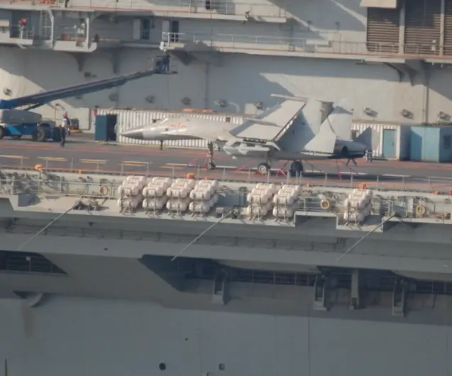 Photographs have emerged on the Chinese internet showing what seems to be a J-15 jet parked on the flight deck of the former Varyag aircraft.