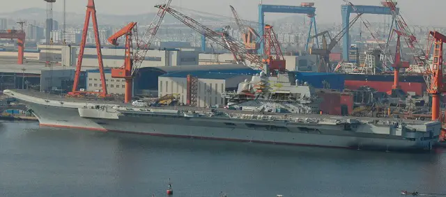 Photographs have emerged on the Chinese internet showing what seems to be a J-15 jet parked on the flight deck of the former Varyag aircraft.