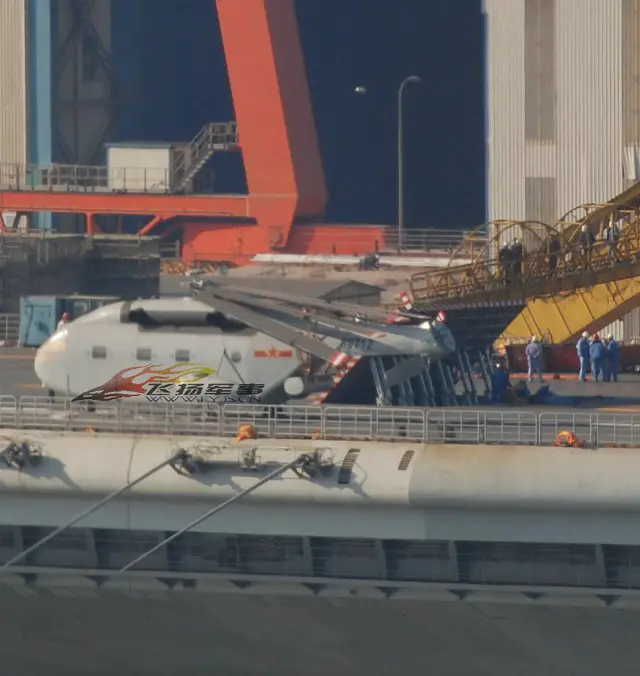 Photographs have emerged on the Chinese internet showing what seems to be a J-15 jet parked on the flight deck of the former Varyag aircraft.