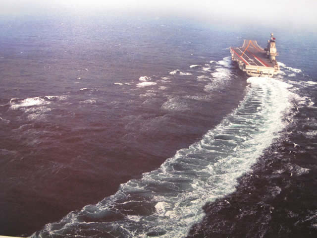 Stern view of the Chinese Navy Liaoning aircraft carrier (ex-Varyag) underway at sea