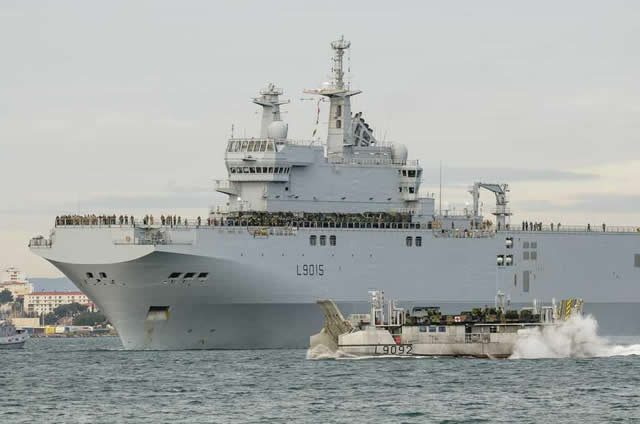 Monday, January 21, 2013, French Navy Dixmude LHD (Mistral class) sailed off on alert from Toulon naval base. With a record (for the class) load of French Army troops, vehicles and equipment belonging to a battalion task force (JTF-battle group) the amphibious vessel contributes to the strengthening of the French military deployed in Operation Serval.