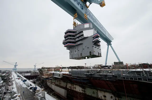 Huntington Ingalls Industries celebrated significant progress on January 26, 2013 as the 555-metric ton island was lowered onto the nuclear-powered aircraft carrier Gerald R. Ford (CVN 78) at the company's Newport News Shipbuilding (NNS) division. The island will serve as the command center for flight deck operations aboard the first of the next-generation class of aircraft carriers.