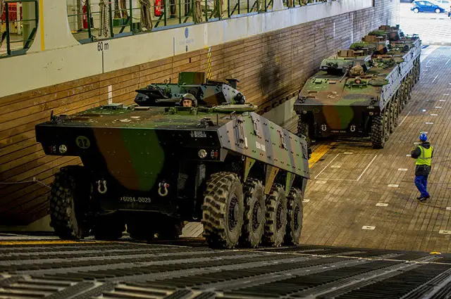 French Army VBCI Infantry Fighting Vehicles have been loaded in a French Navy (Marine Nationale) Dixumde LHD Amphibious Assault Ship, Force Projection & Command Vessel at the Toulon naval base. The Dixmude will then sail off to West Africa to deploy the armored vehicles and French Army troops (two companies from 92th Infantry Regiment) in support to the current French operation in Mali named "Serval".