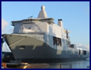 On Saturday, March 8th, Dutch Defence Minister Jeanine Hennis-Plasschaert ceremonially named the Karel Doorman, the new Joint Support Ship for the Royal Netherlands Navy. The ceremony took place in Vlissingen at the shipyard operated by Damen Schelde Naval Shipbuilding. With a length of 204.7 metres, the Karel Doorman is the biggest ship in the Dutch navy.