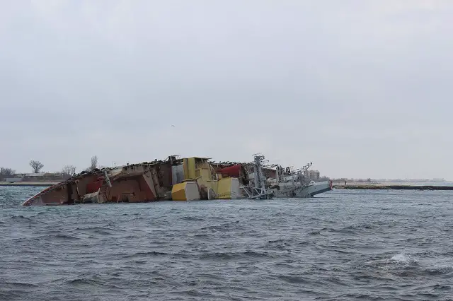 The Russian navy sank its decommissioned cruiser Ochakov at the mouth of Donuzlav lake on the Black Sea, trapping Ukrainian naval vessels there, Ukraine’s Defense Ministry said in a statement on its website.