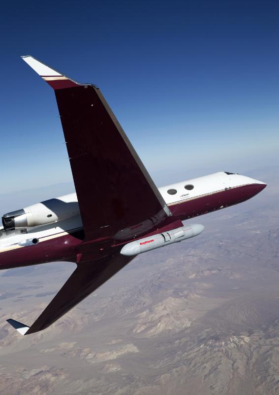 An early version of Raytheon's Next Generation Jammer pod flies on a Gulfstream test bed over the range at Air Naval Station China Lake during a flight test on October 16th. The test was conducted to prove out the maturity of critical technologies in a representative environment against real-world threats. (PRNewsFoto/Raytheon Company)