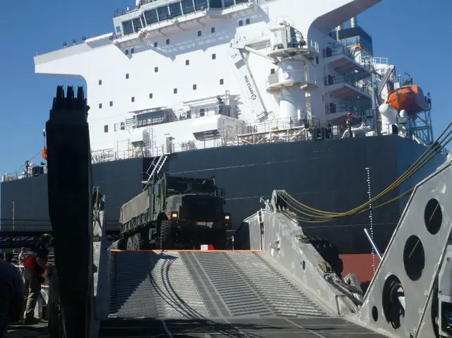 Following the deployment of Millinocket’s vehicle ramp, a Medium Tactical Vehicle Replacement (MTVR) with M149 (Water Buffalo) transits from Montford Point to Millinocket.