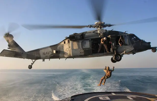 On January 22, 2015, six US Navy Explosive Ordnance Disposal (EOD) divers participated in an exchange of know-how with the crew of the French Navy (Marine Nationale) anti-aircraft frigate Jean Bart. For the past 3 months Jean Bart is deployed with aircraft carrier USS Carl Vinson in the Carrier Strike Group One for escort mission. In order to share their know-how and to strengthen interoperability, 6 US clearance divers were airlifted to the Jean Bart for an "EOD day".