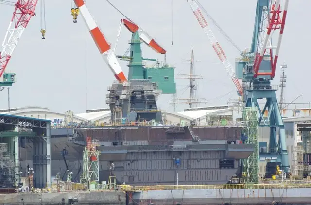 Recent pictures have emmerged showing the construction work in progress on Japan Maritime Self Defense Force (JMSDF) second Izumo-class helicopter carrier. The island has been placed on the hull of the destroyer in the dry construction dock at the Ishikawajima-Harima Heavy Industries Co., Ltd (IHI Corporation) in Yokohama. The DDH-184 which has yet to be nammed should be launched in August this year.