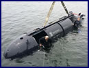 Huntington Ingalls Industries' (HII) Undersea Solutions Group (USG) subsidiary made history in June as its two female divers became the first women to crew and drive a dual-mode underwater vehicle (DMUV). Chloe Mallet, an ocean engineer, and Andrea Raff, a mechanical engineer, crewed and operated USG's Proteus, a submersible able to operate as a manned swimmer delivery vehicle (SDV) and as an unmanned undersea vehicle (UUV).