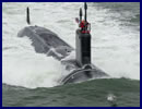 The Virginia-class attack submarine USS John Warner (SSN 785) was commissioned during a ceremony attended by more than 2,500 in its future homeport of Naval Station Norfolk, Aug. 1, 2015. Proudly displaying its motto "On a Mission to Defend Freedom," the ship is the 12th Virginia-class attack submarine to join the Navy's operating fleet. 