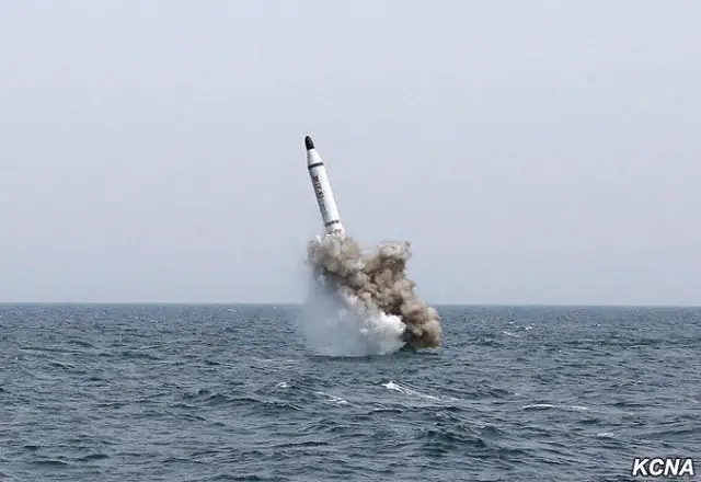 North Korea officially announced (and released pictures showing) the first SLBM test (Submarine Launched Ballistic Missile) from its new Sinpo class SSBN (Ballistic Missile Submarine). North Korea leader Kim Jong-Un personally oversaw the launch, according to state-run KCNA agency. The report detailed how the launcher submarine dived at the sound of a combat alarm to test fire the missile.
