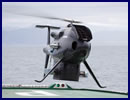 Schiebel’s CAMCOPTER® S-100 Unmanned Air System (UAS) continues its successful shipboard trials when demonstrating its outstanding capabilities to the South African Navy from 20 to 23 October 2015 at False Bay, Western Cape, South Africa.