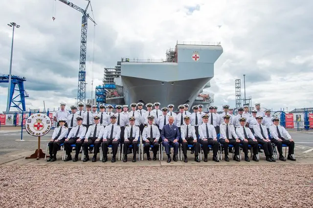 The second of the largest warships ever built for the Royal Navy, the Queen Elizabeth Class carrier HMS PRINCE OF WALES, was given the royal seal of approval when HRH The Prince of Wales, (or Duke of Rothesay as he is referred to in Scotland), visited Babcock’s Rosyth Facilities and signalled for the final section to be lowered into place.