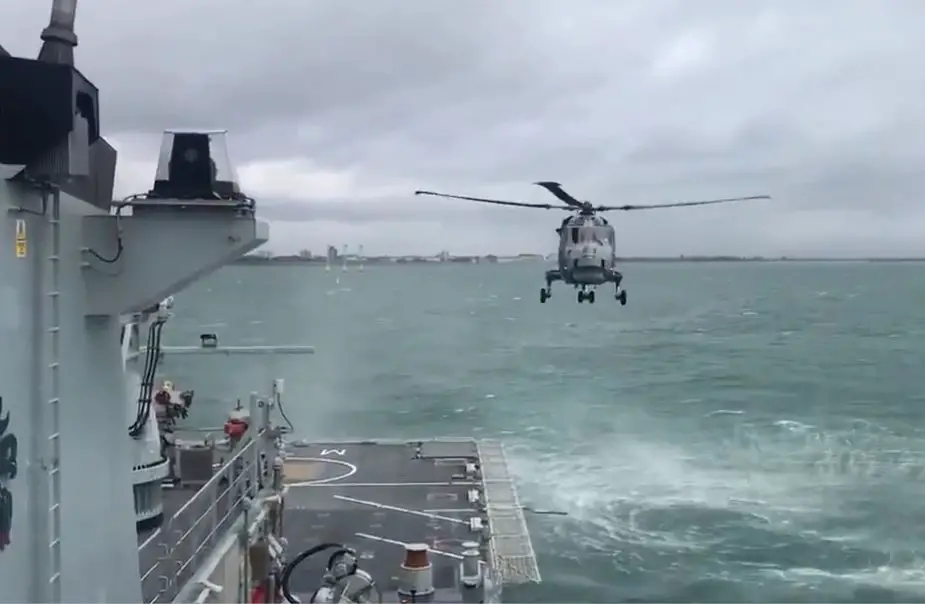 Royal Navy helicopter landing on patrol boat for first time 925 001