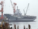 China's first aircraft carrier was delivered and commissioned to the People's Liberation Army (PLA) Navy Tuesday, according to report by National Defense Ministry's official website.