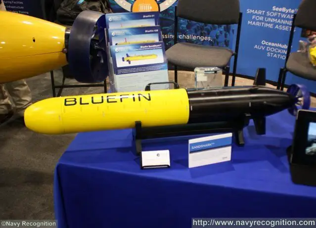 During Sea-Air-Space 2015, Bluefin Robotics, part of Batelle Company, is showcasing a small, open-platform, autonomous underwater vehicle (AUV) designed for developers, the Sandshark. SandShark combines a standardized low-cost tail with core vehicle systems, a large modular payload area, and an open development platform. This combination provides a flexible subsea “reference design” to support rapid technology development.