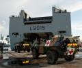 A VAB SAN (Armored vehicle in Ambulance configuration) about to enter the well-deck of the Mistral class vessel.